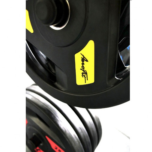 Олимпийский обрезиненный диск AeroFit 1.25 кг, черно-желтый. Посадочное кольцо из нержавеющей стали, Ø 51,5 мм